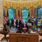 Fabiano Lana: “Foto de Flávio Bolsonaro com Trump simboliza a identidade mundial da direita”